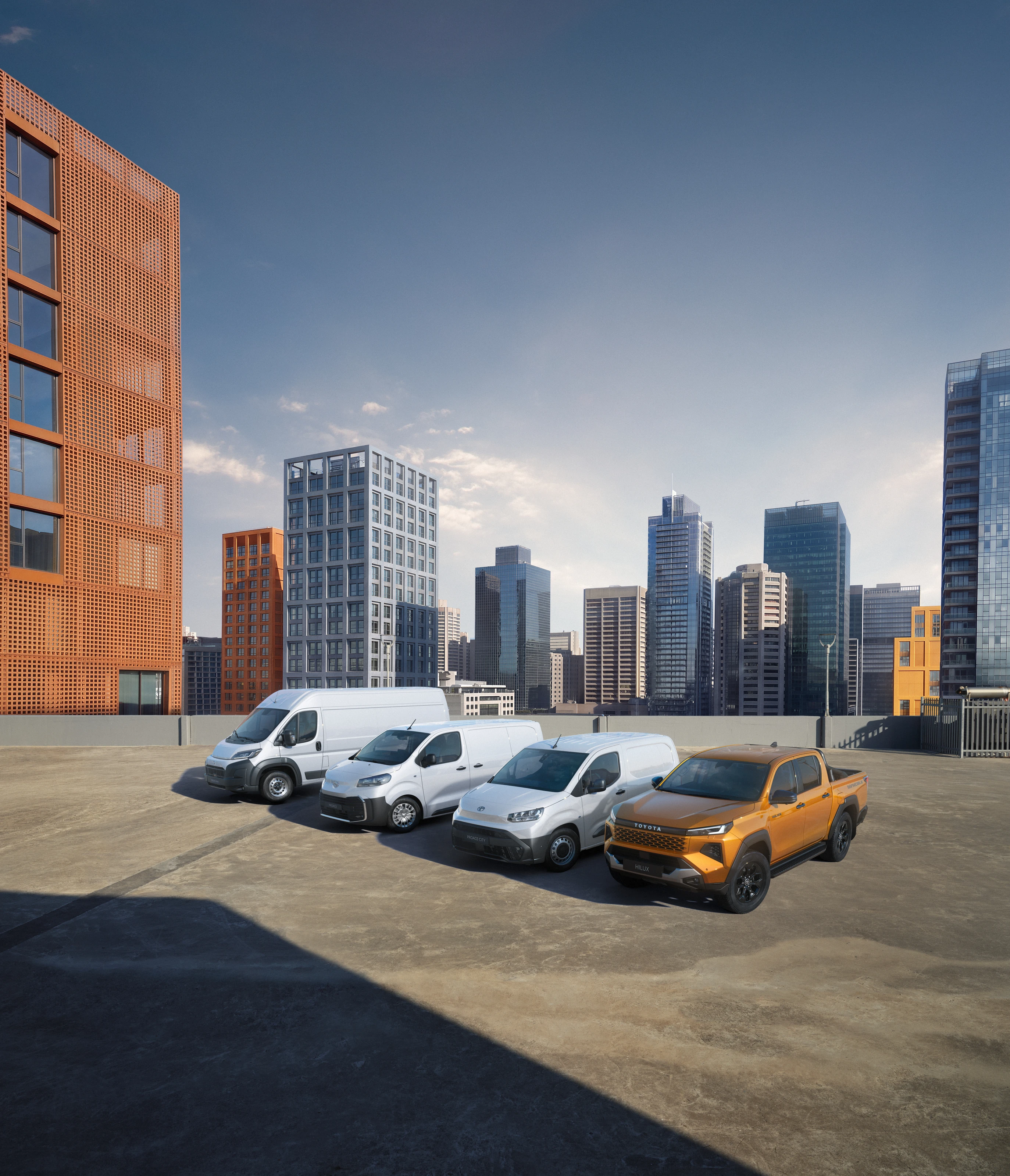 Toyota fleet against a city skyline, MHEV variant